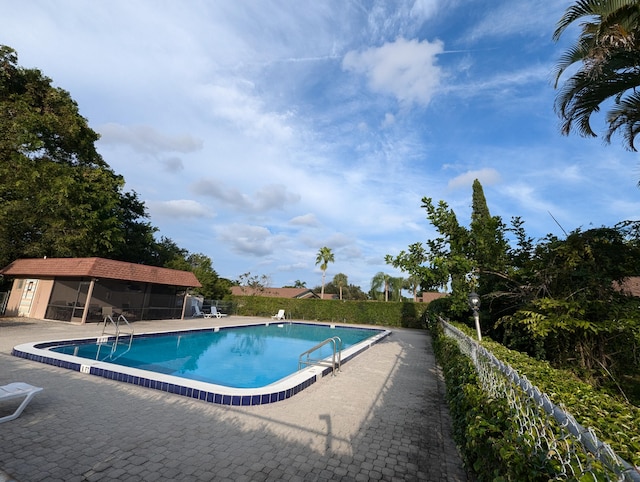 1914 Palmland Dr Unit B, Boynton Beach, FL 33436 - community pool with a patio and fence