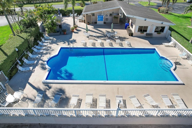 view of swimming pool with a patio area