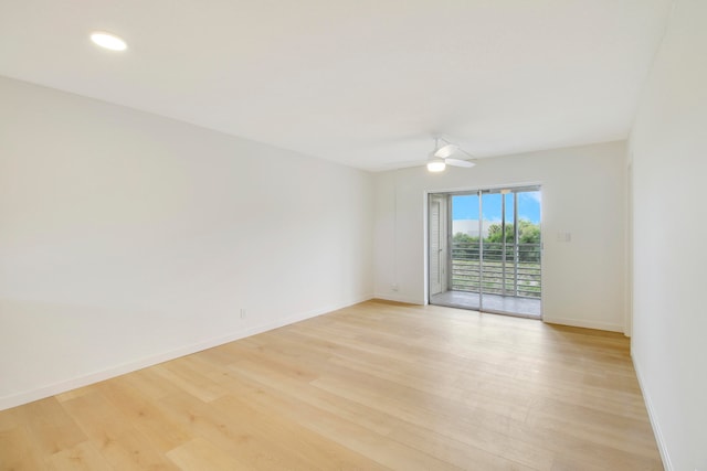 empty room featuring light hardwood / wood-style floors and ceiling fan