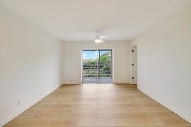 spare room with light hardwood / wood-style flooring and ceiling fan