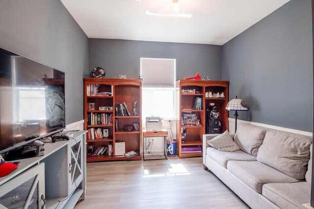 living room with light hardwood / wood-style floors