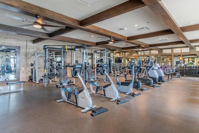 exercise room with brick wall and ceiling fan