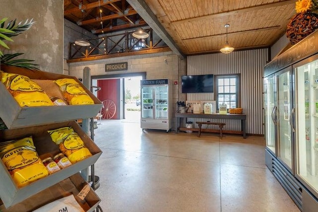 interior space featuring concrete flooring and wooden ceiling