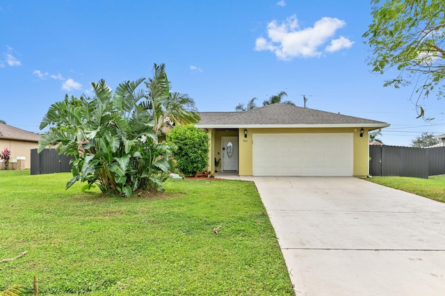 single story home with a front yard and a garage