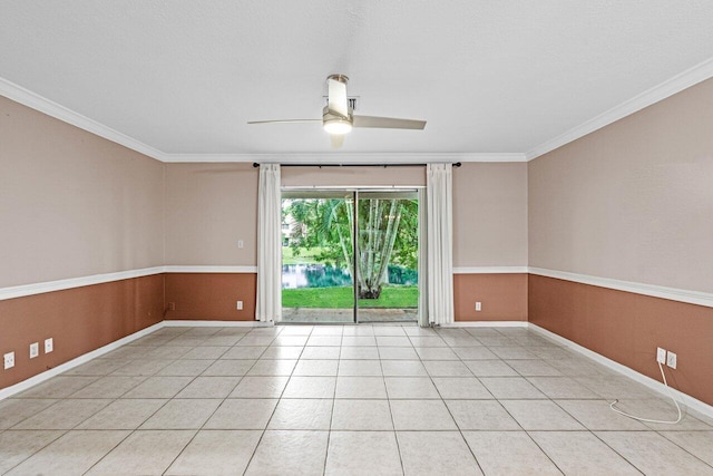 tiled empty room featuring crown molding and ceiling fan