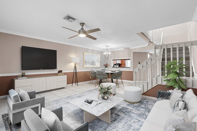 tiled living room featuring crown molding and ceiling fan with notable chandelier