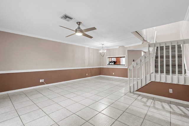 unfurnished room featuring crown molding, ceiling fan with notable chandelier, and light tile patterned floors