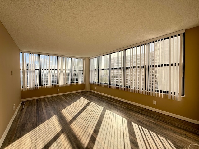 unfurnished sunroom featuring a healthy amount of sunlight