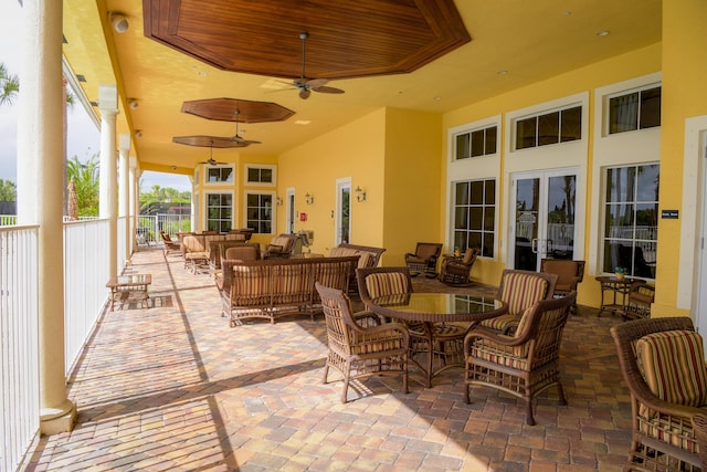 view of patio / terrace featuring an outdoor living space and ceiling fan