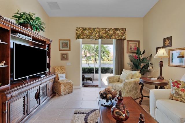 tiled living room with vaulted ceiling