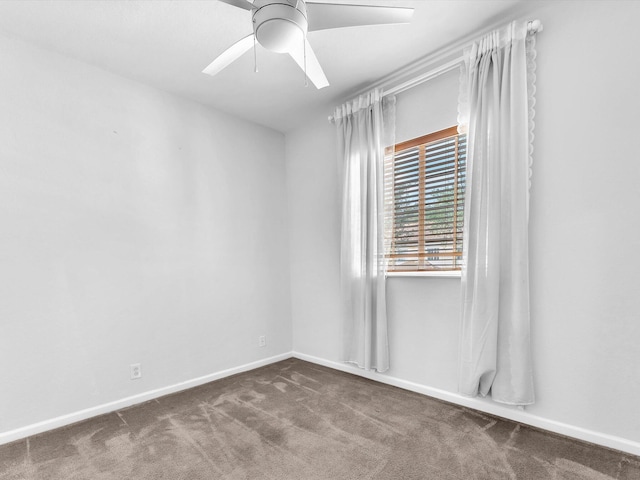 unfurnished room featuring carpet floors and ceiling fan