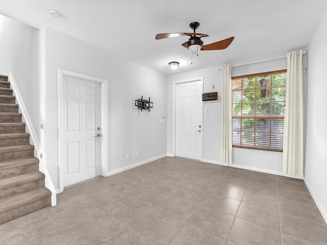 entryway featuring ceiling fan