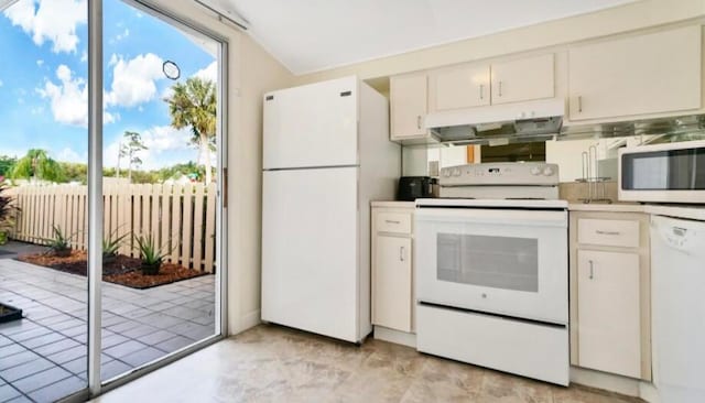 kitchen featuring white cabinets and white appliances