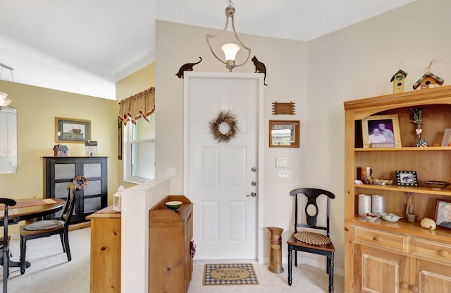 foyer entrance featuring light tile patterned floors