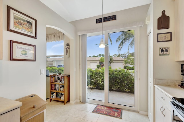 entryway featuring light tile patterned floors