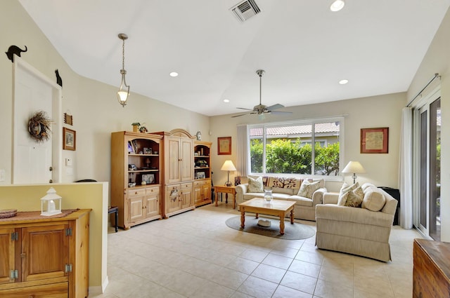 tiled living room featuring ceiling fan