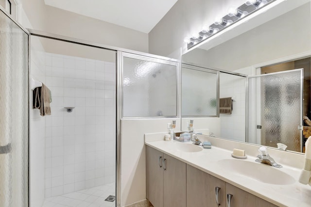 bathroom featuring vanity and walk in shower