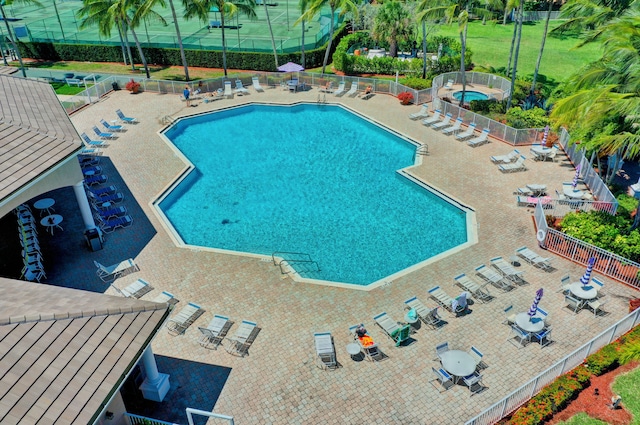 view of swimming pool with a patio