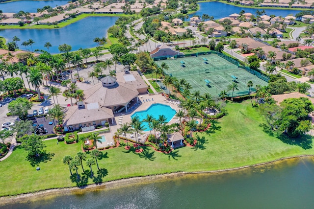 birds eye view of property featuring a water view