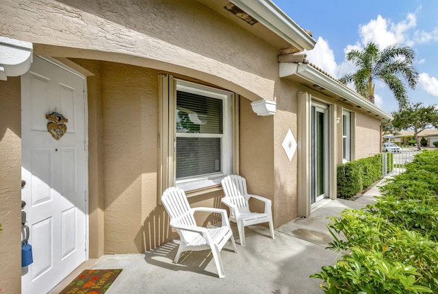 doorway to property with a patio area