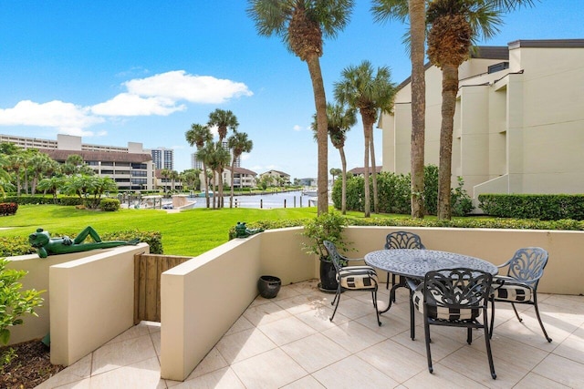 view of patio / terrace with a water view