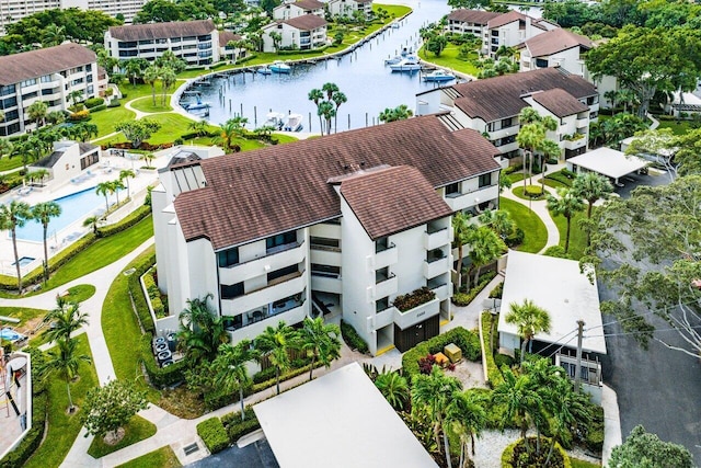 bird's eye view with a water view