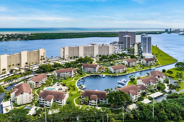 birds eye view of property featuring a water view