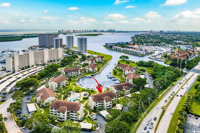 birds eye view of property featuring a water view