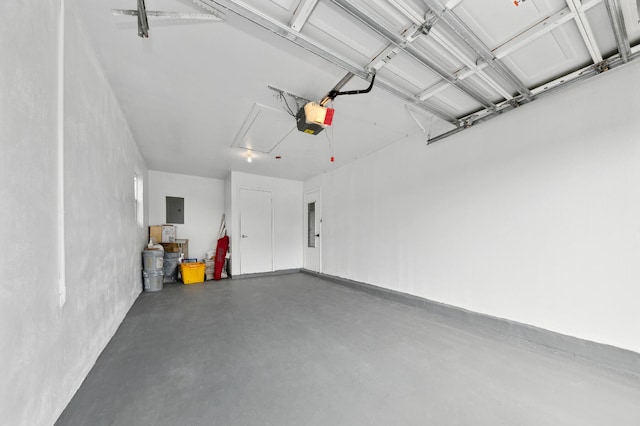 garage featuring a garage door opener and electric panel