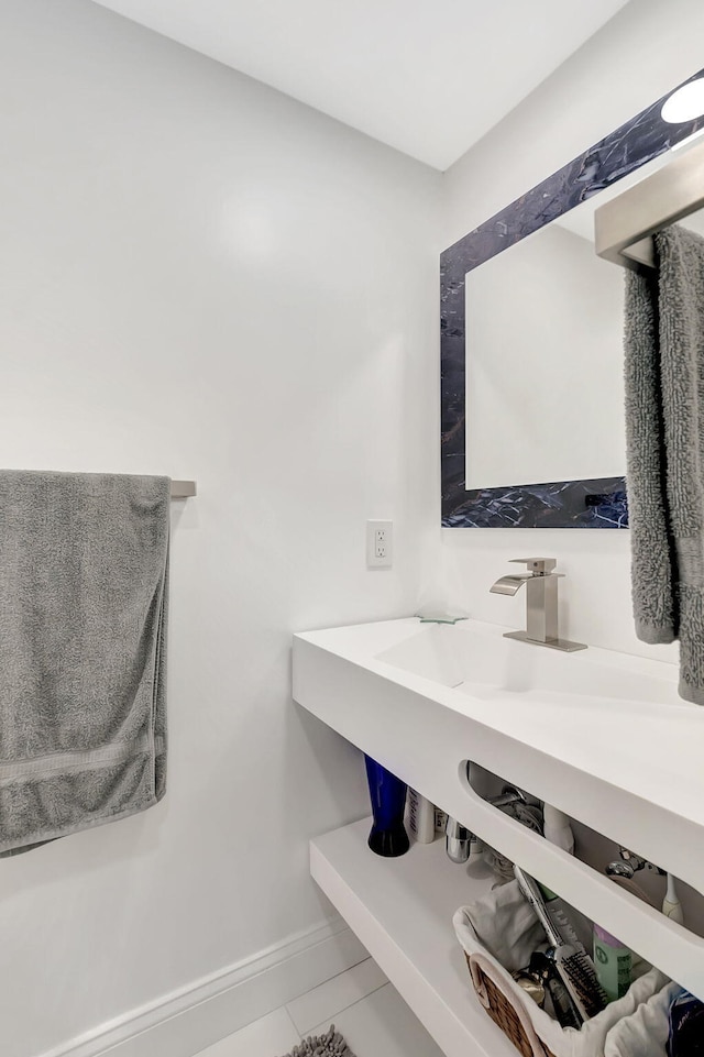 bathroom with vanity and tile patterned floors