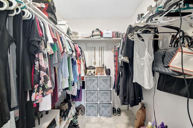 720 E Ocean Ave Unit 303, Boynton Beach, FL 33435 - spacious closet with tile patterned flooring
