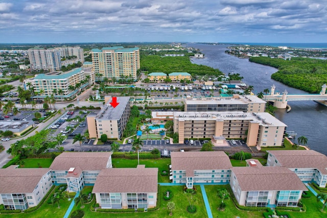 birds eye view of property featuring a water view