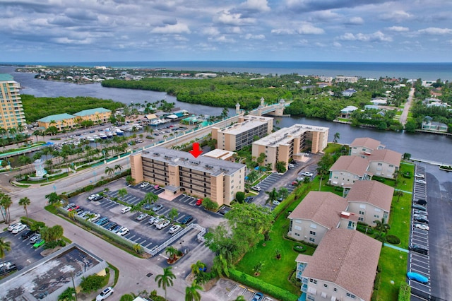 bird's eye view with a water view