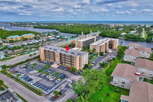 drone / aerial view with a water view