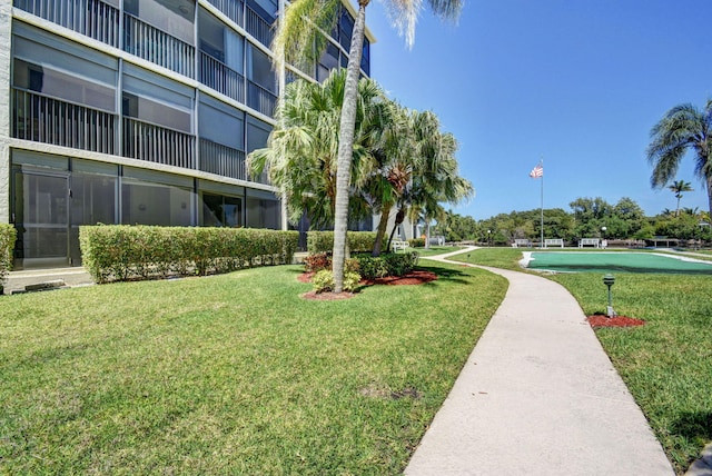 720 E Ocean Ave Unit 303, Boynton Beach, FL 33435 - view of home's community with a yard