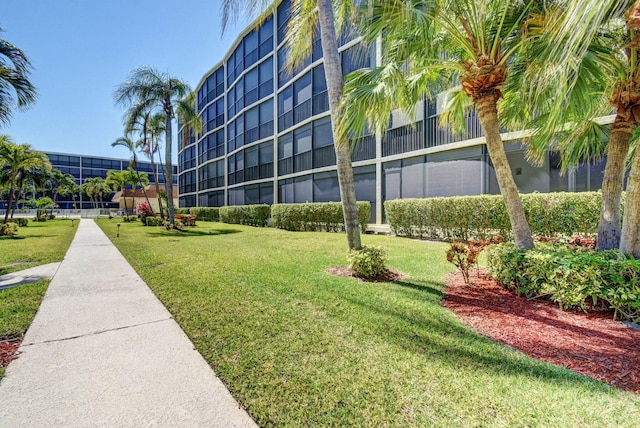 720 E Ocean Ave Unit 303, Boynton Beach, FL 33435 - view of home's community with a lawn