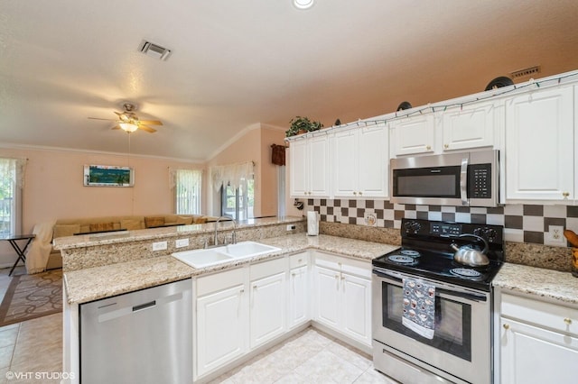 kitchen featuring sink, white cabinetry, kitchen peninsula, and stainless steel appliances