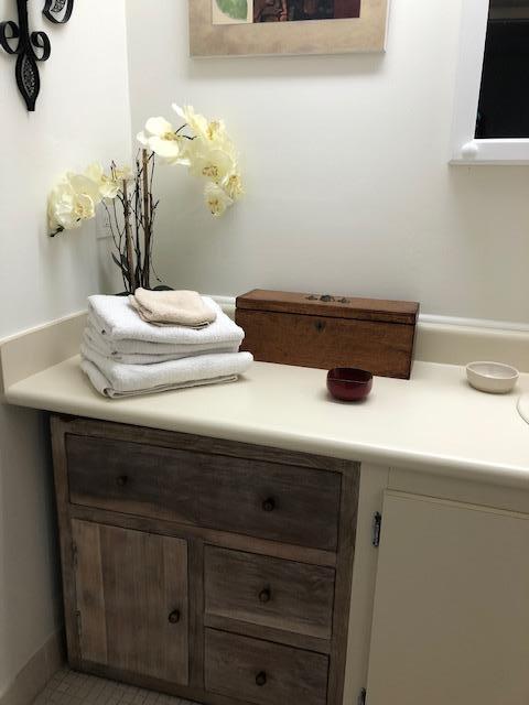 bathroom with vanity and tile patterned flooring