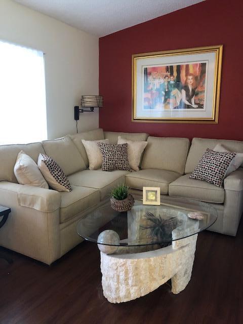 living room featuring dark hardwood / wood-style flooring