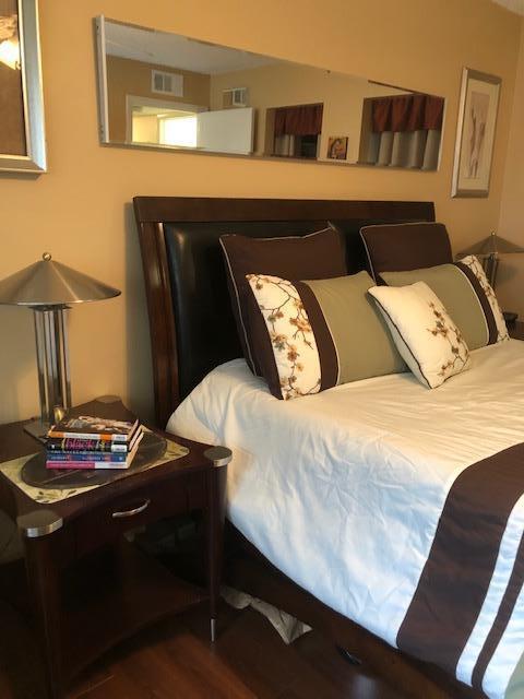 bedroom featuring hardwood / wood-style floors