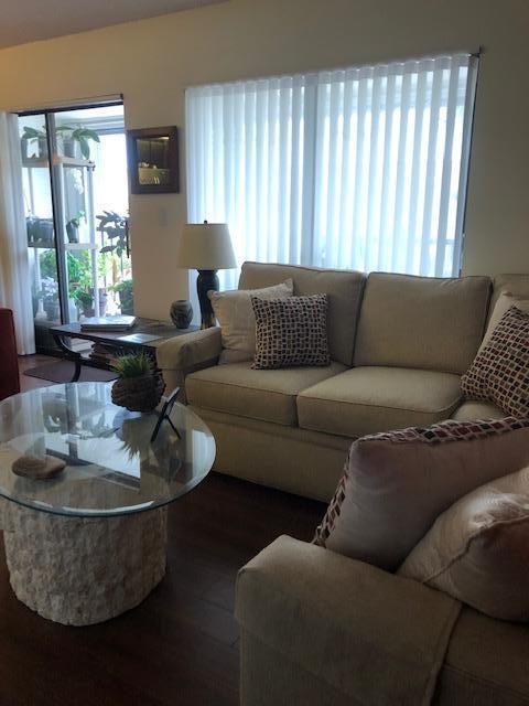 living room featuring dark hardwood / wood-style flooring