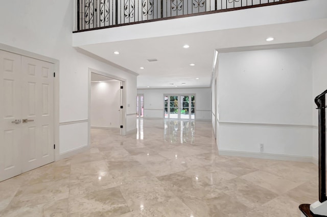 930 N Parkside Cir N, Boca Raton, FL 33486 - hall with recessed lighting, baseboards, marble finish floor, and a towering ceiling