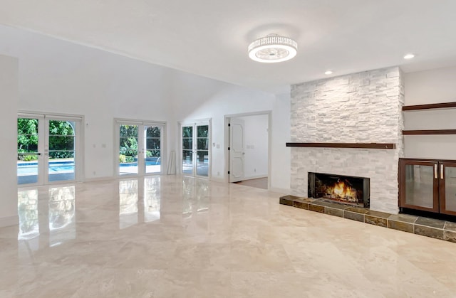 930 N Parkside Cir N, Boca Raton, FL 33486 - unfurnished living room featuring baseboards and a fireplace