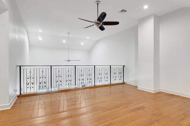930 N Parkside Cir N, Boca Raton, FL 33486 - unfurnished room featuring vaulted ceiling, wood finished floors, visible vents, and ceiling fan