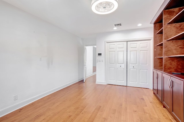 930 N Parkside Cir N, Boca Raton, FL 33486 - unfurnished bedroom with visible vents, baseboards, recessed lighting, light wood-style floors, and a closet