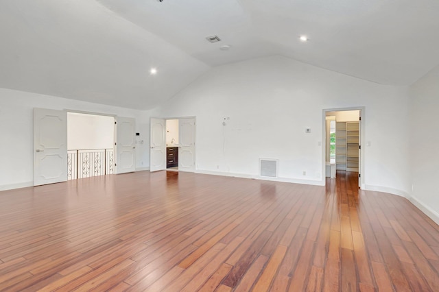 930 N Parkside Cir N, Boca Raton, FL 33486 - interior space with visible vents, baseboards, high vaulted ceiling, and wood finished floors