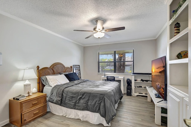 bedroom with light hardwood / wood-style floors, crown molding, a textured ceiling, and ceiling fan