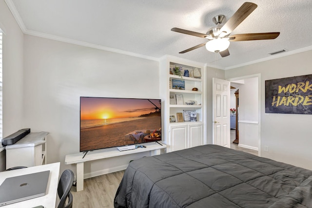 bedroom featuring light hardwood / wood-style floors, crown molding, a textured ceiling, and ceiling fan