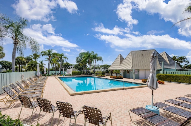 view of swimming pool featuring a patio