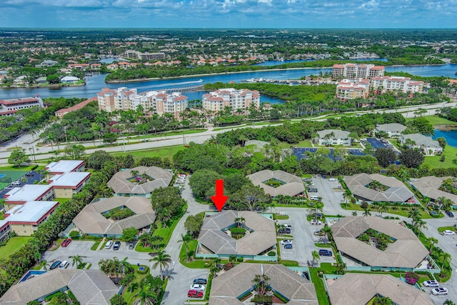 birds eye view of property featuring a water view